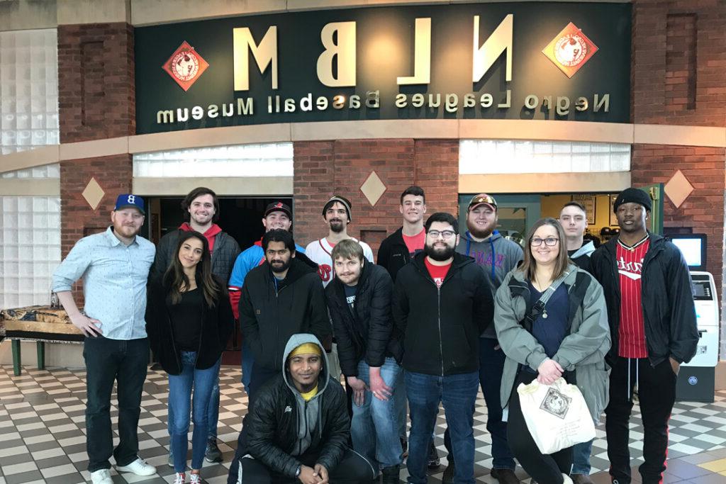 Students posing in front of the entrance to the Negro League Baseball Museum